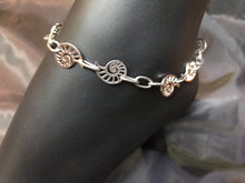 Load image into Gallery viewer, Delicate stainless steel nautilus charms form links in the chain in this rust-resistant anklet that can stay with you throughout all your adventures.