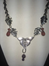 Load image into Gallery viewer, A necklace made from plated metal charms, faceted glass beads, and round glass pearls.