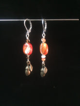 Load image into Gallery viewer, Leverback earrings made from glass beads and metal acorn charms.