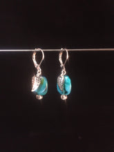 Load image into Gallery viewer, Leverback earrings made with blue blown glass beads with swirls and metal leaf charms.åÊ The plated metal leafs and leverback findings come in three available tones; a dark tone, lighter silvery tone or a goldish tone.