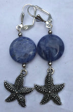 Load image into Gallery viewer, Sodalite beads and scallop charms dangle below silver plated leverbacks. Variations: Scallop, Starfish, Conch.
