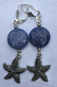 Sodalite beads and scallop charms dangle below silver plated leverbacks. Variations: Scallop, Starfish, Conch.