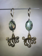 Load image into Gallery viewer, Playful metal octopus charms dangle below a 14x12mm serpentine bead for a total drop length of 1.5&quot; on these silver plated brass leverback drop earrings.