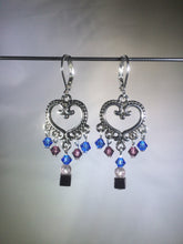 Load image into Gallery viewer, Blue glass and Czech crystal beads dangle from a central brass heart focal in these 1.25&quot; drop brass chandelier leverback earrings.