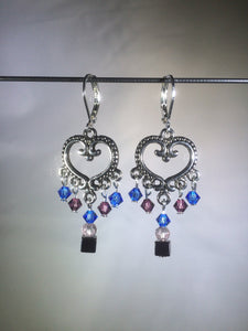 Blue glass and Czech crystal beads dangle from a central brass heart focal in these 1.25" drop brass chandelier leverback earrings.