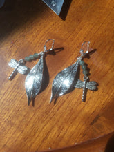 Load image into Gallery viewer, Dragonflies skim under aventurine beads in front of a metal leaf charm in these 2&quot; drop silver plated brass leverback earrings.