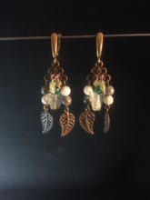 Load image into Gallery viewer, A necklace and set of leverback earrings made from glass beads, gemstone beads, and metal charms on chandelier findings. Forms a matching set with necklace 1NCK0058.