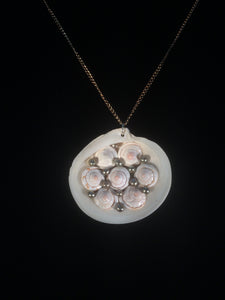 Clam Shell Pendant Necklace Adorned with Pearls