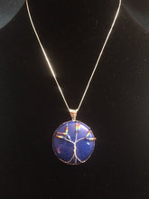 Load image into Gallery viewer, This tree of life uses the inclusive rainbow as the color theme made with glass seed beads on fine silver wire on a silver chain. The background is a cabochon of Mountain Jade (dolomite marble) which has been dyed to its color.