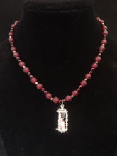 Load image into Gallery viewer, An hourlass charm adorns this 18&quot; garnet and glass bead strand.